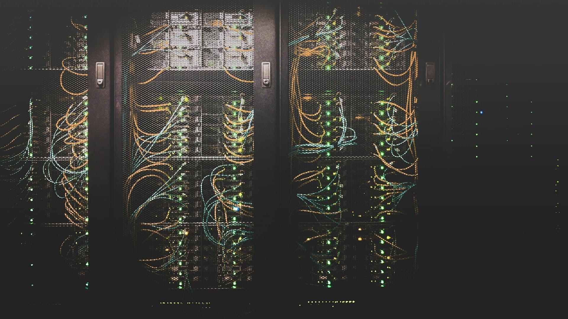Dark blue-toned enterprise data center corridor
